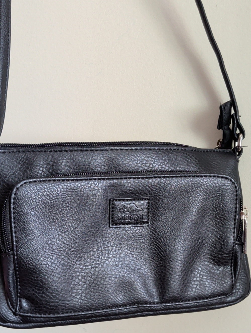 Roots Black Pebbled Crossbody Bag